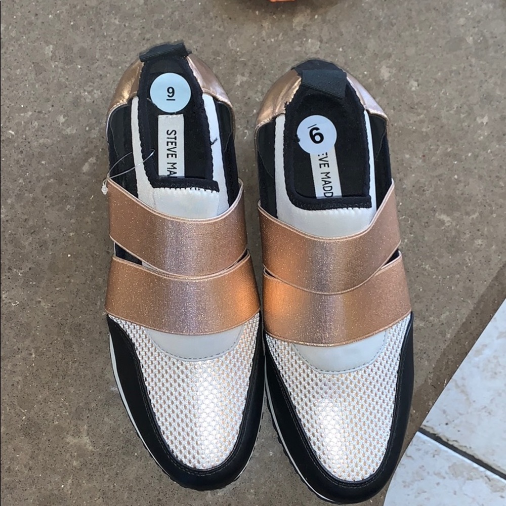 Rose gold, black, and grey shoes